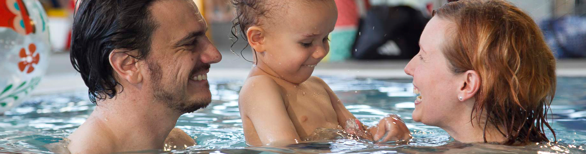 Mum, Dad and Bub in Quiet time swim session