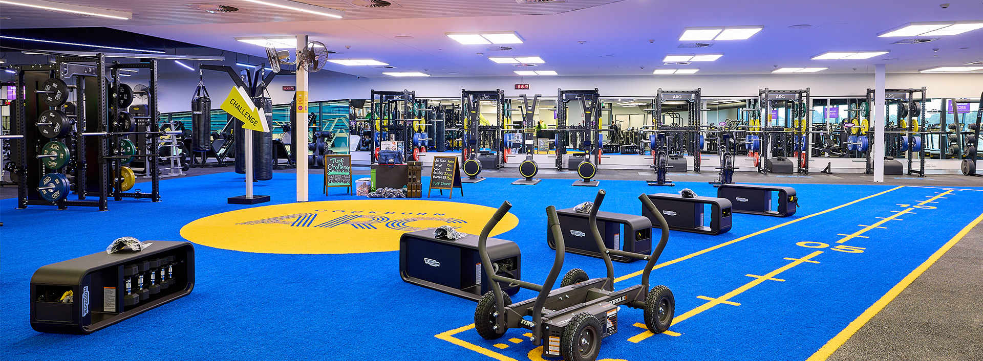 Photo of landscape view of gym floor and equipment