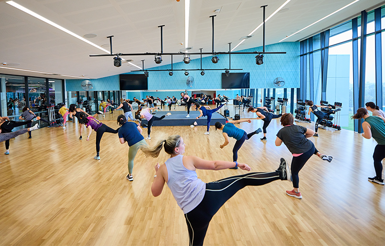 Women kicking in Body Combat class