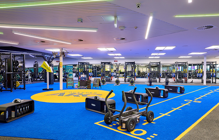 Empty gym floor space showcasing functional area
