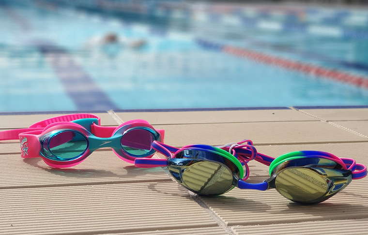 Goggles on side of pool