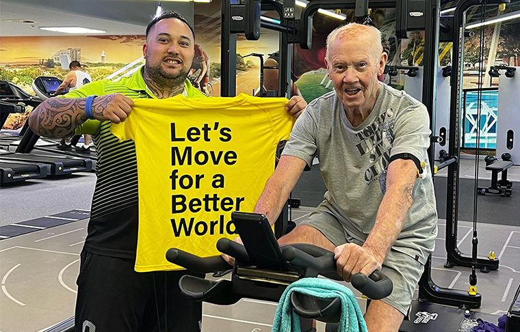 Fitness coach and member Fred working out in the gym