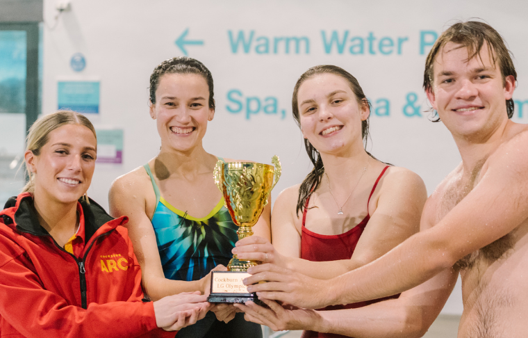 Club members with a trophy