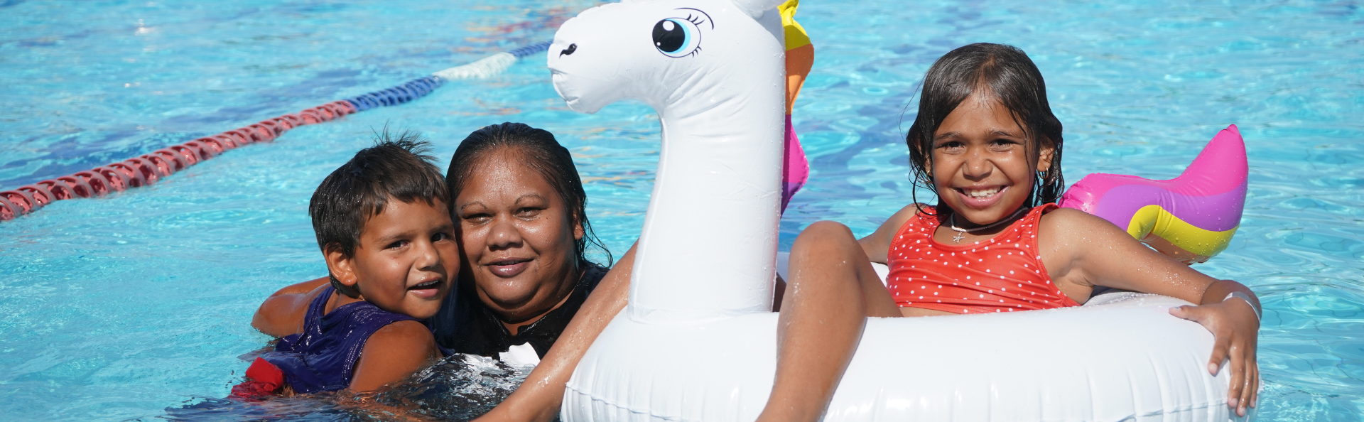 A family having fun in the pools.