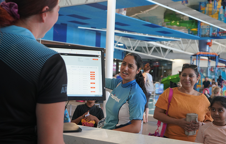 Supervisor helps parent through computer