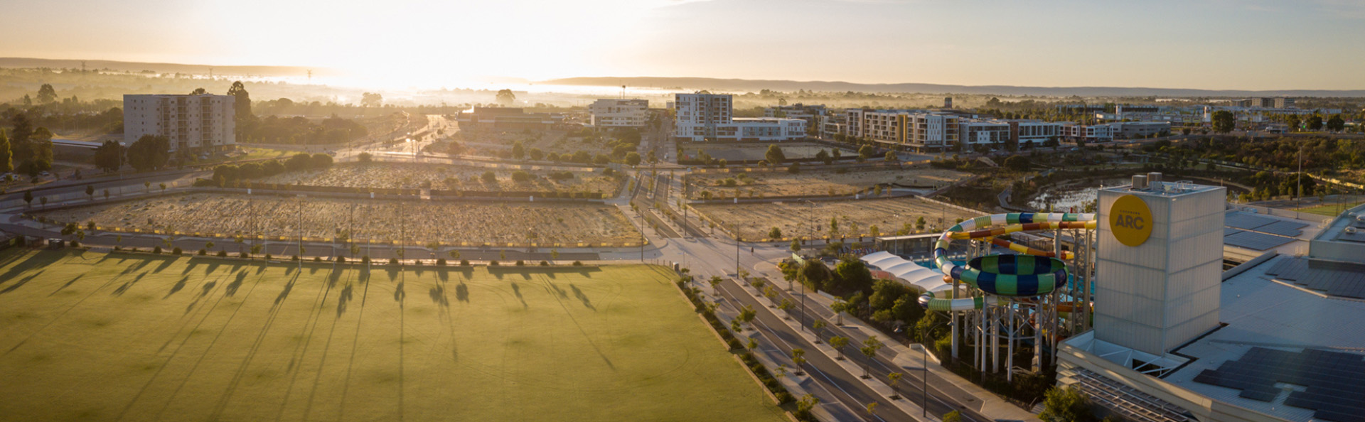 Wide sunrise view of the centre and surrounding areas.