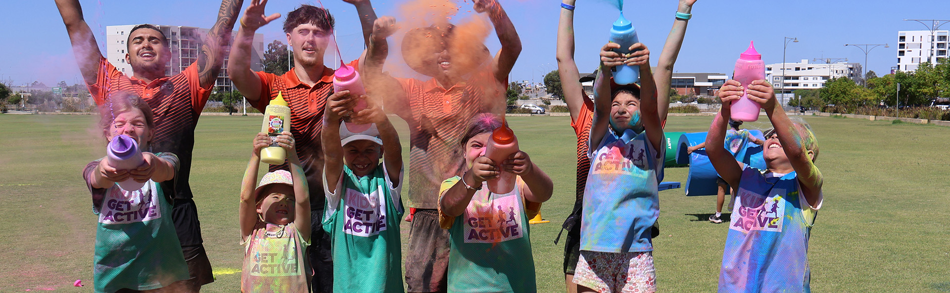 Kids playing with paint for a colour run