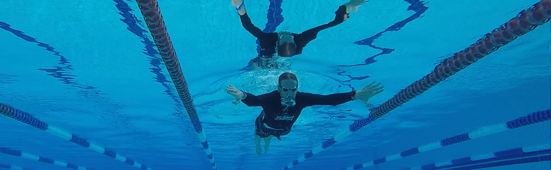swimmer under water in 50m pool
