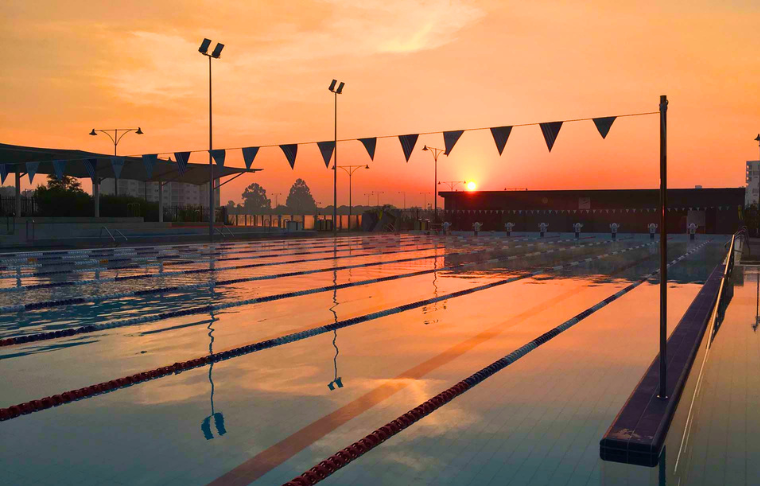 Sunrise over a 50m pool