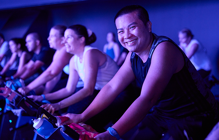 Group of people cycling in The TRIP class